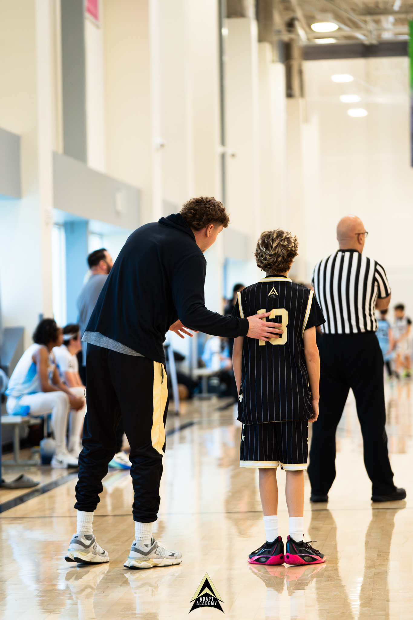 ADAPT coach guiding a player through a tough moment